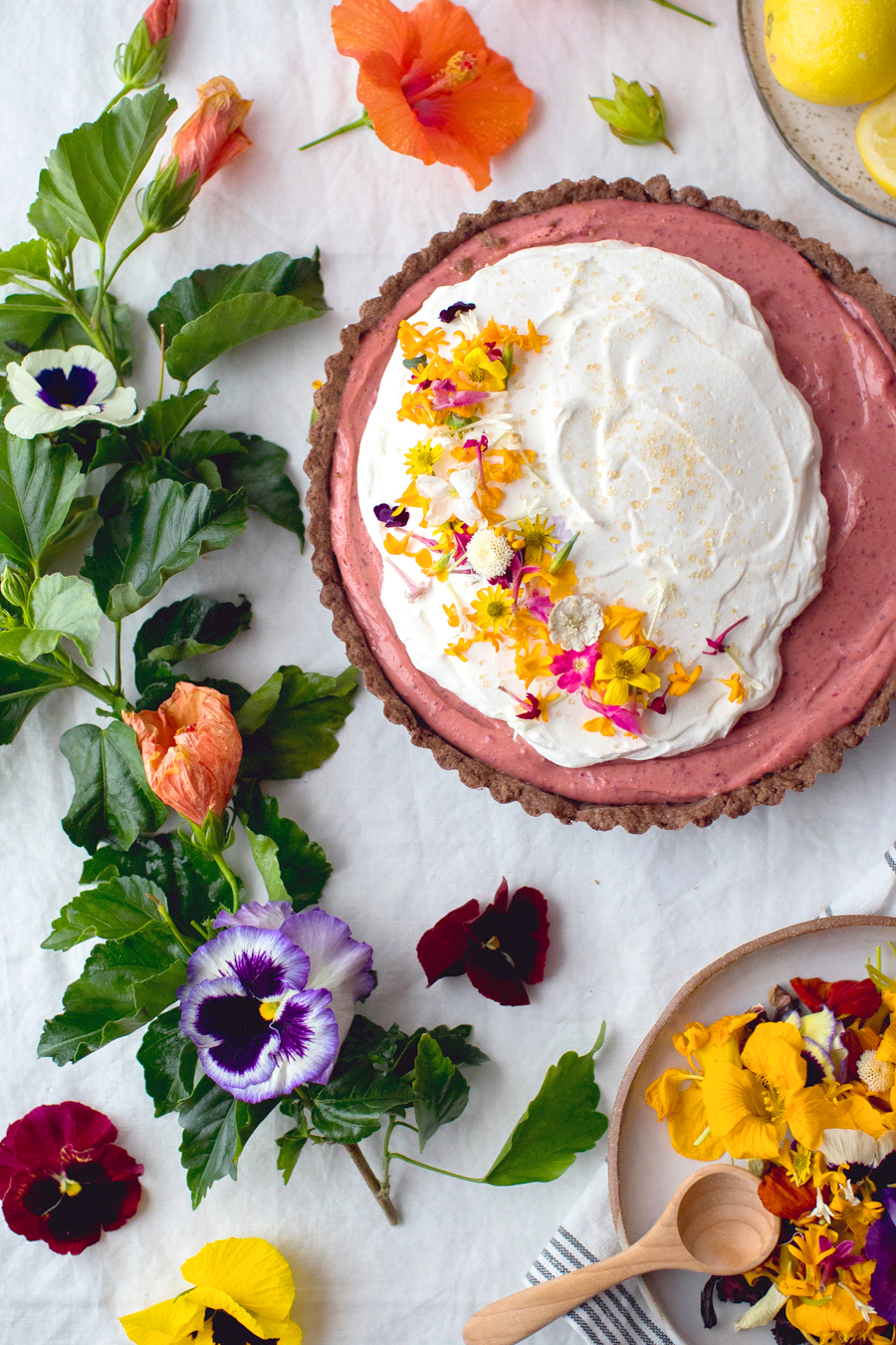 hibiscus lemon curd tart with edible flowers