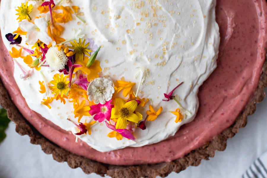 hibiscus lemon curd tart with edible flowers