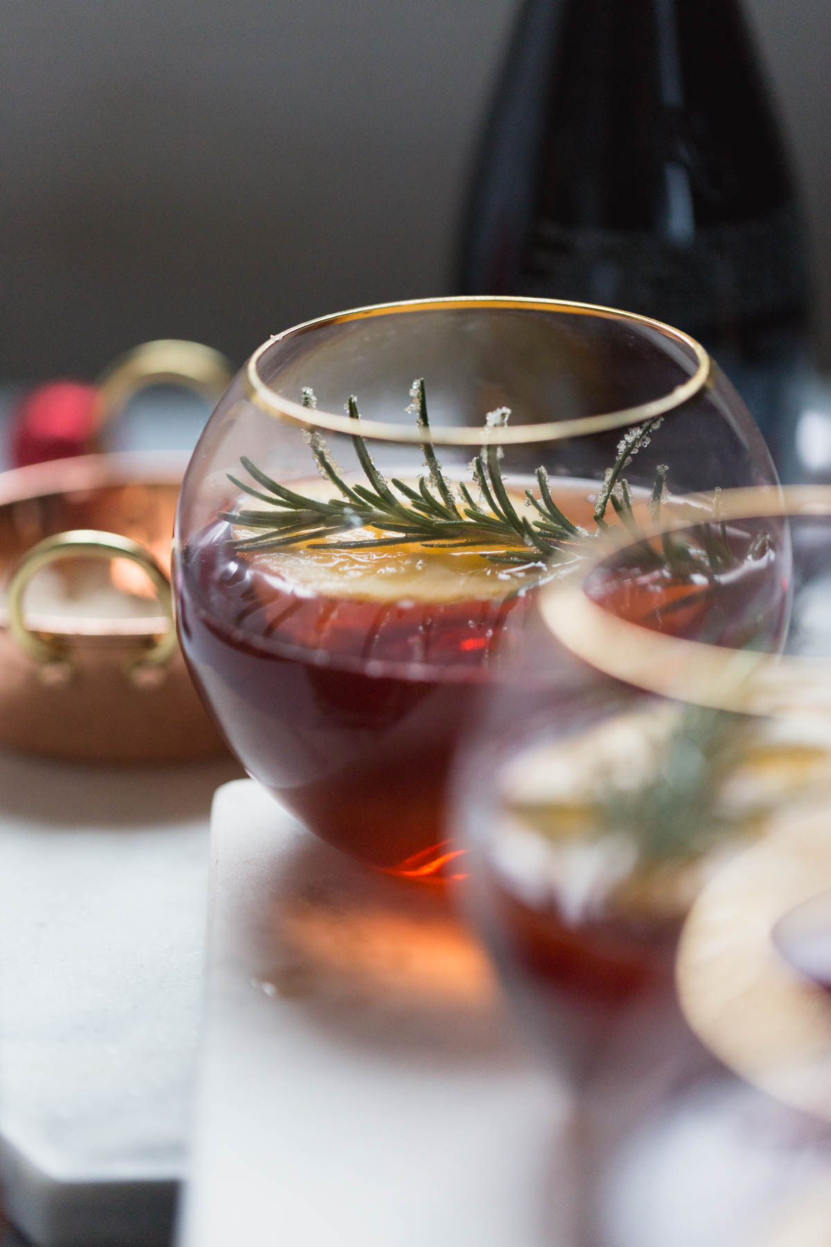 Cranberry Orange Champagne Mimosa with Candied Rosemary