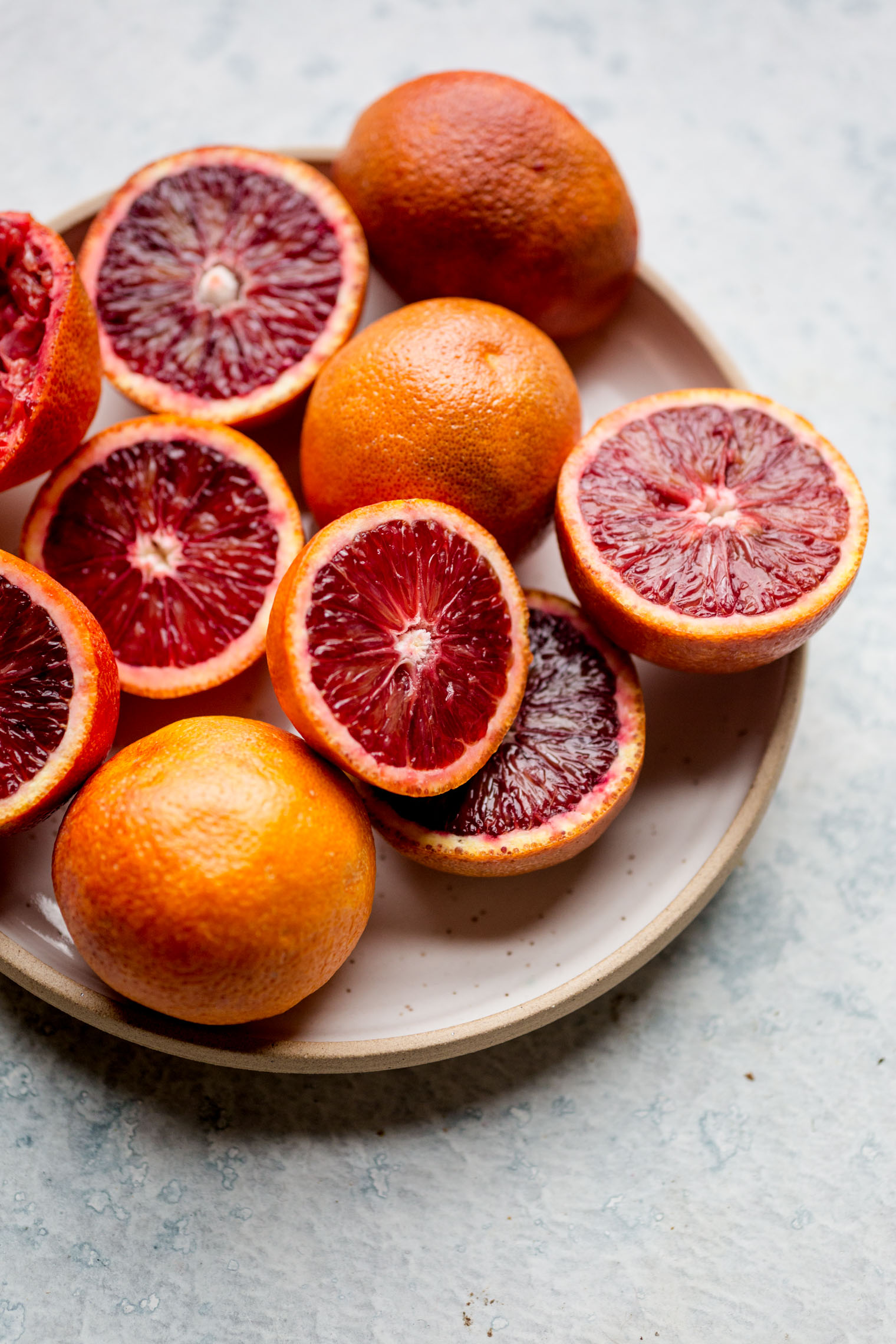 blood oranges on plate