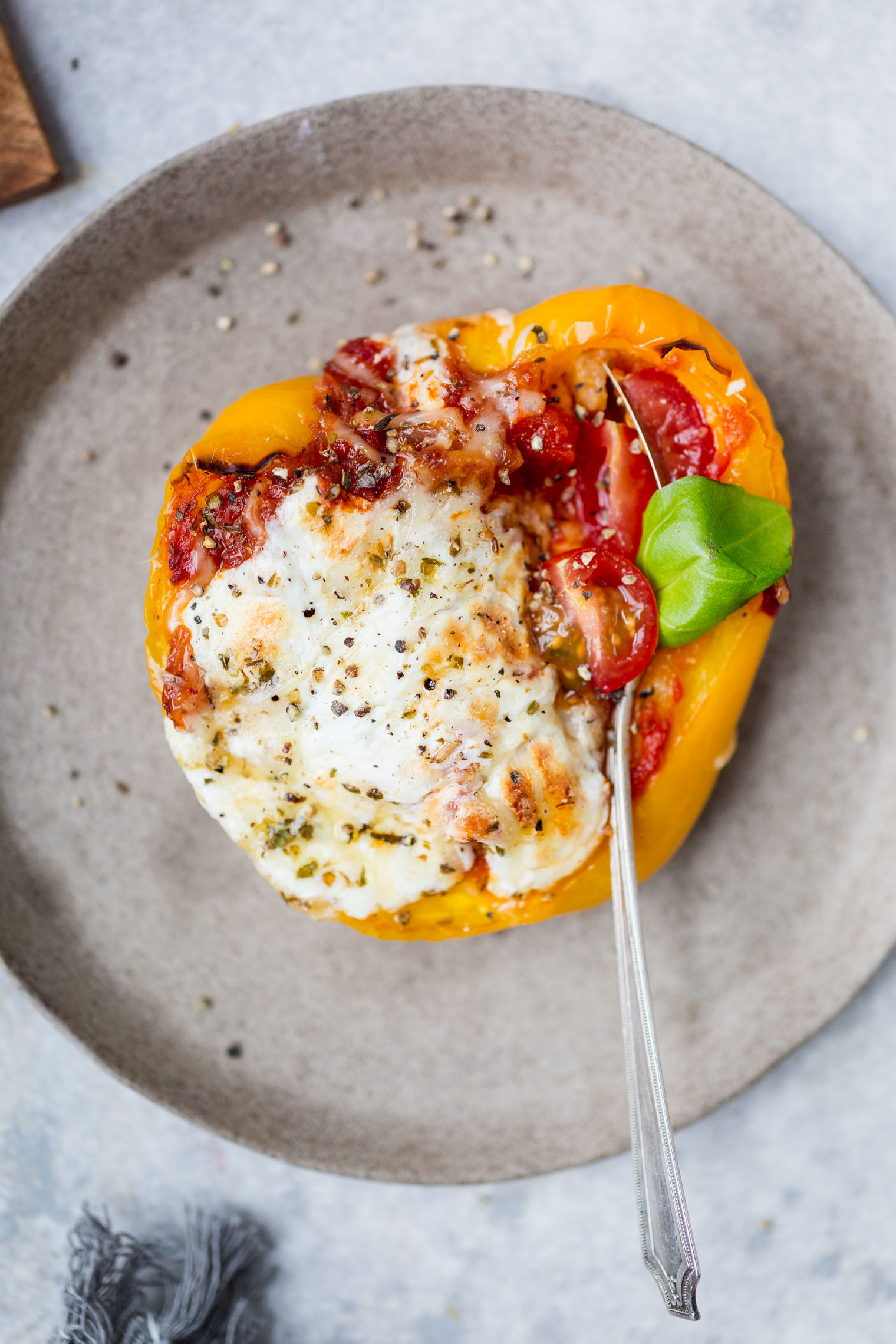 vegetarian stuffed pepper with fork sticking out 