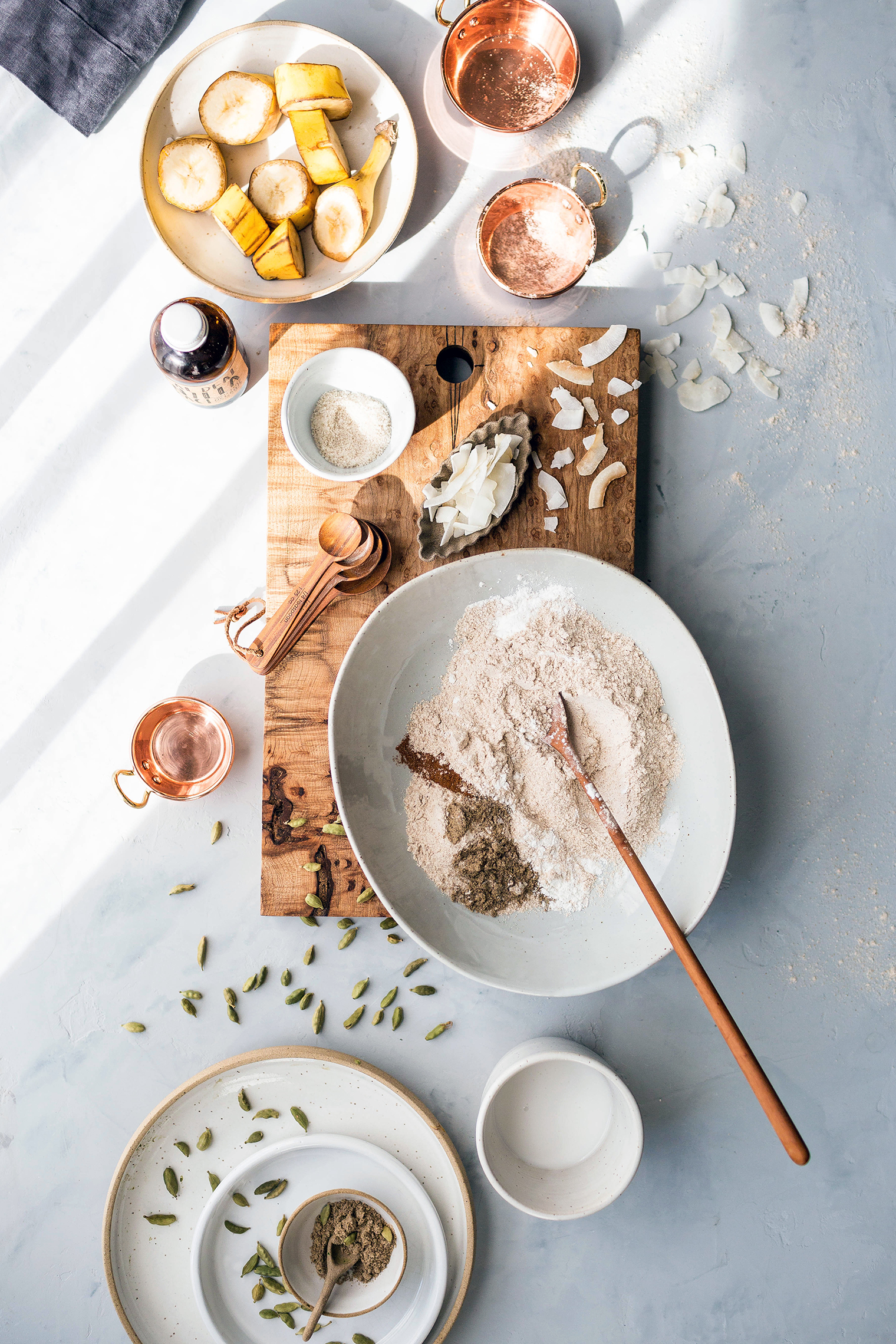 ingredients for healthy banana pancakes laid out on countertop 