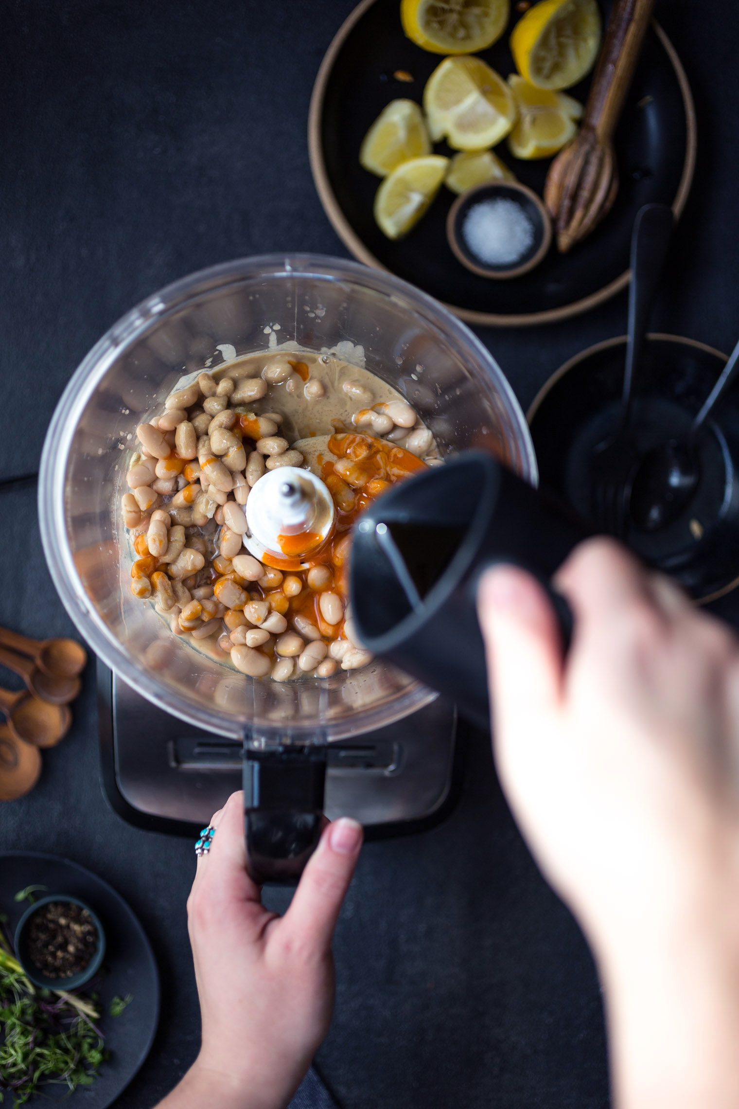 making buffalo hummus in a food processor