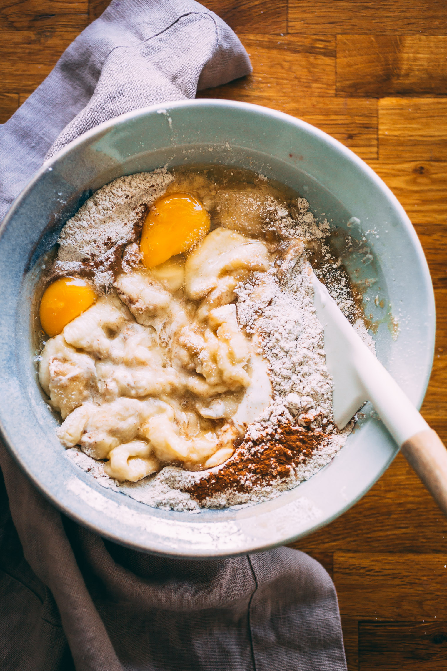 batter for chocolate chip banana bread muffins in large mixing bowl