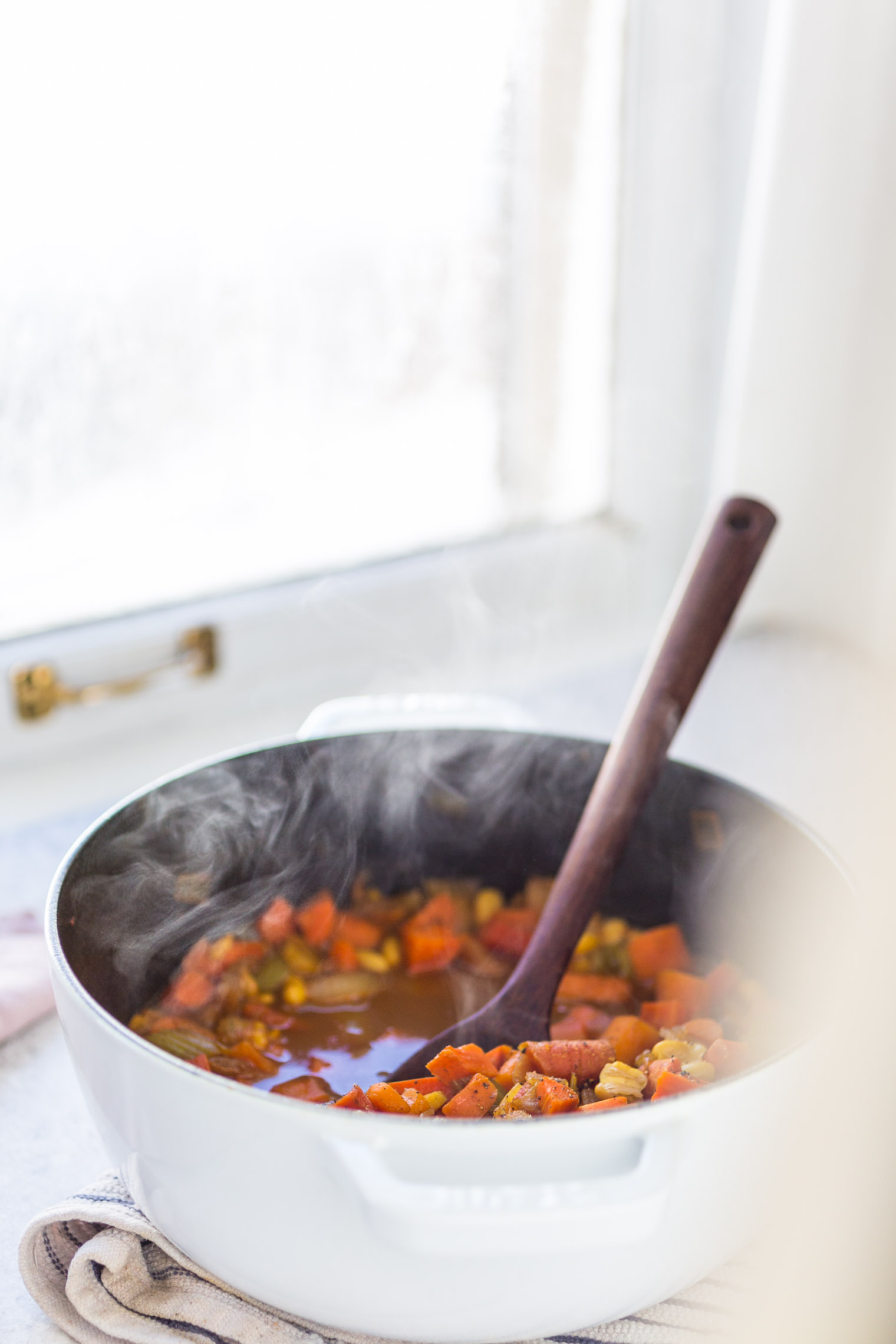 Spiced Carrot Soup with Green Tahini Swirl