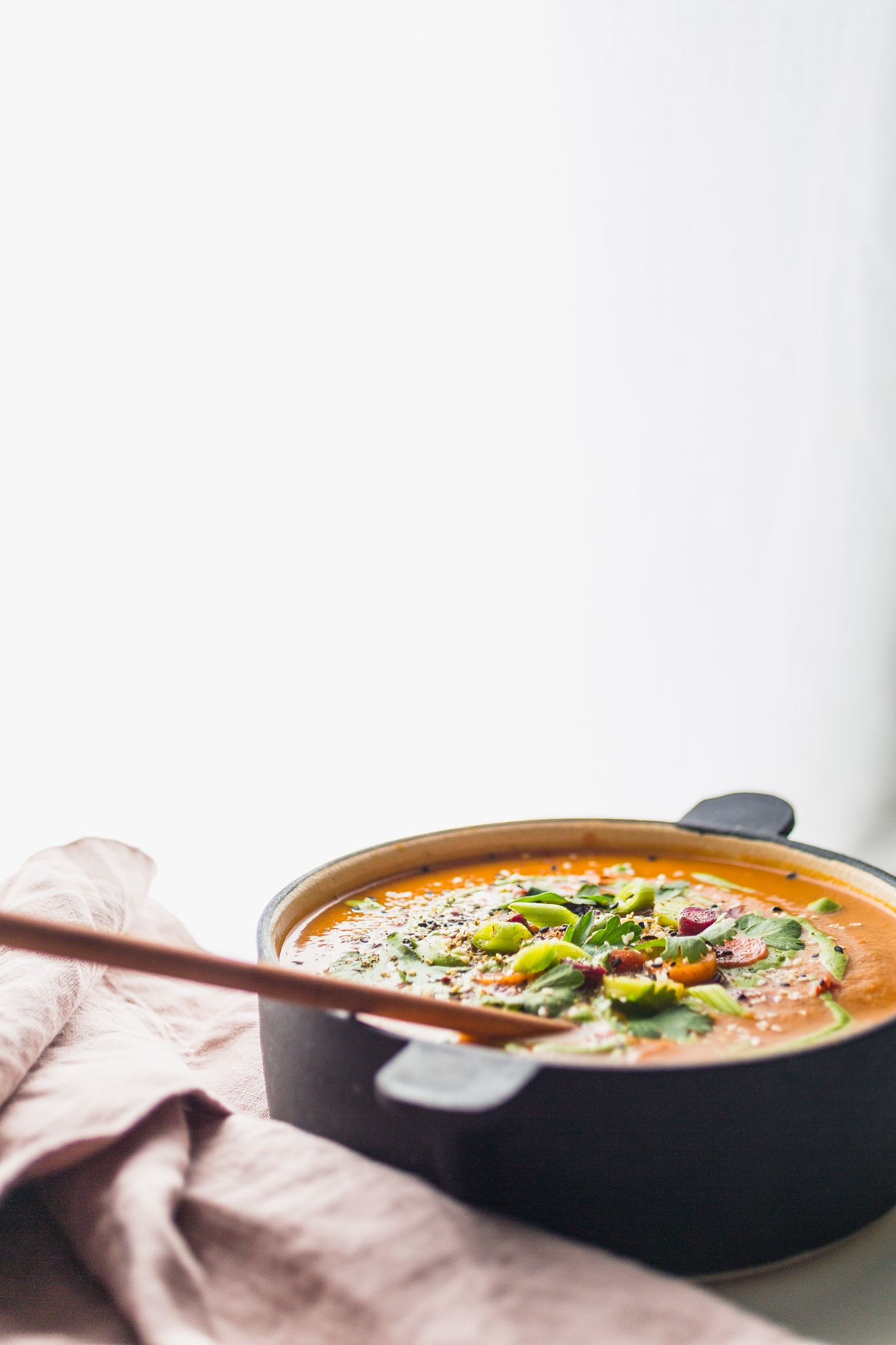 Spiced Carrot Soup with Green Tahini Swirl