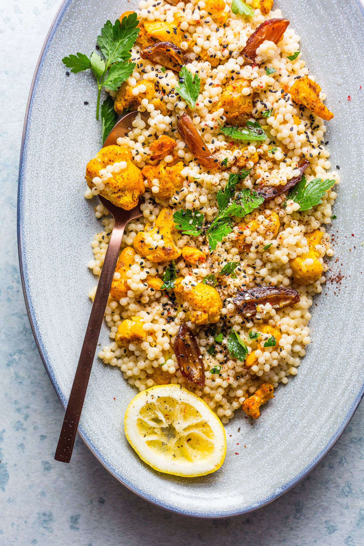 Roasted Cauliflower & Dates Couscous Salad with Creamy Tahini