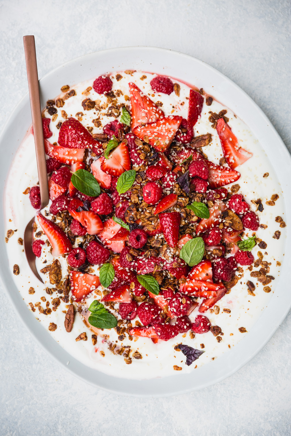 Fruit Salad with yogurt and granola on serving platter