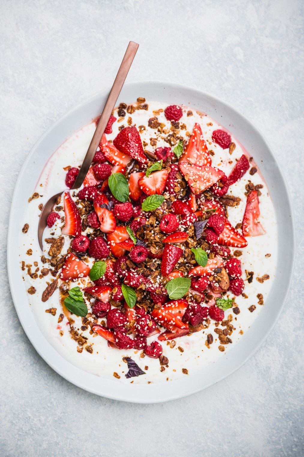 Fruit Salad with yogurt and granola on large serving platter