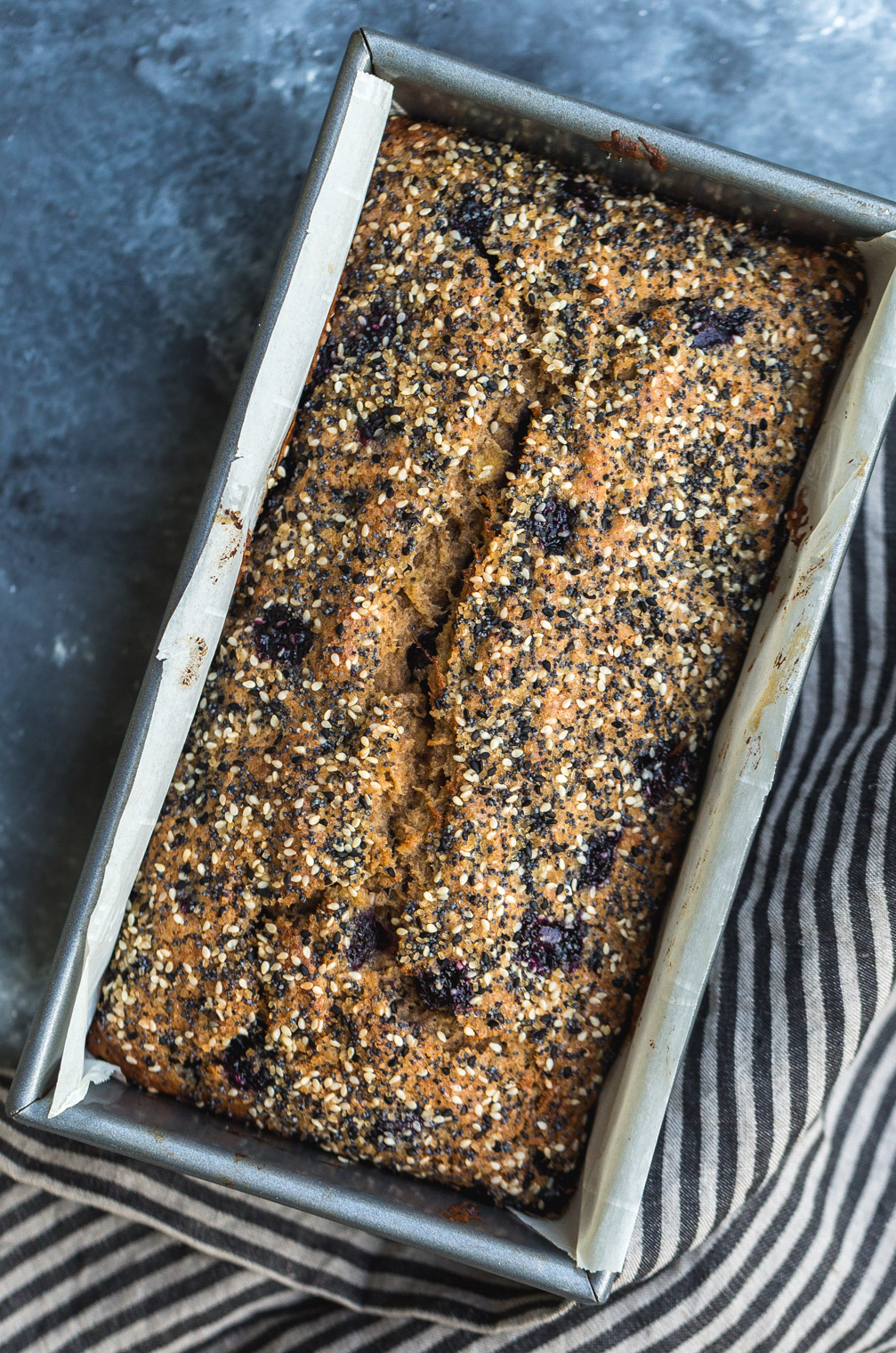 loaf of seedy blueberry banana bread