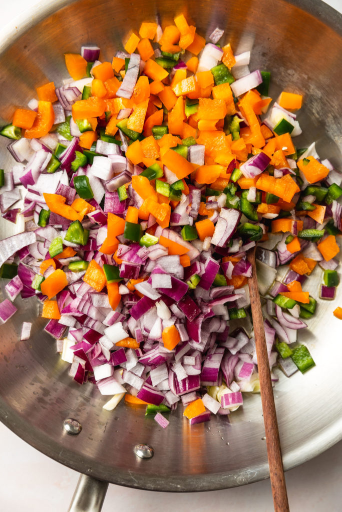 raw veggies in skillet meant for vegetarian chili mac 