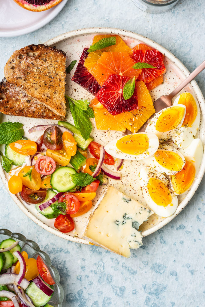 Vegetarian Breakfast Mezze Spread with Tomato Cucumber Salad & Za'atar Eggs