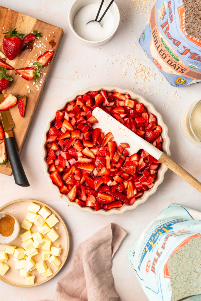 assembling a gluten free strawberry rhubarb crisp
