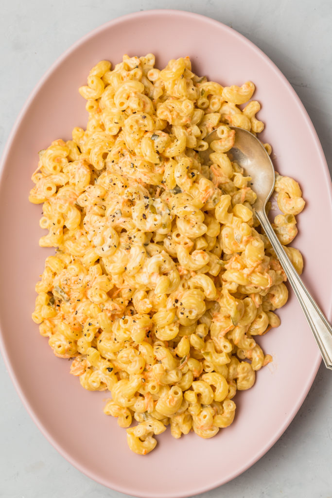 hawaiian style mac salad on pink serving platter