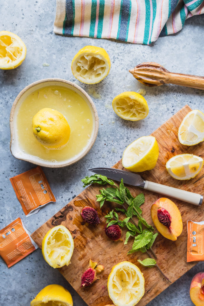 halved lemons on cutting board 