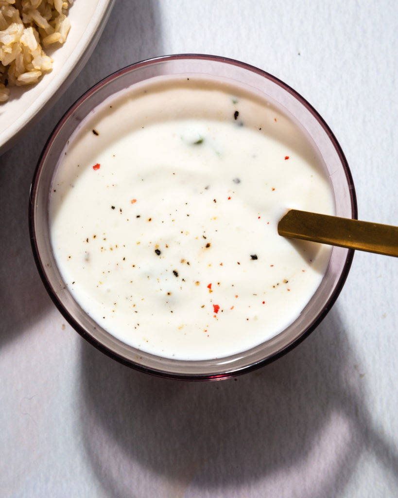 greek yogurt ranch dressing in glass container 