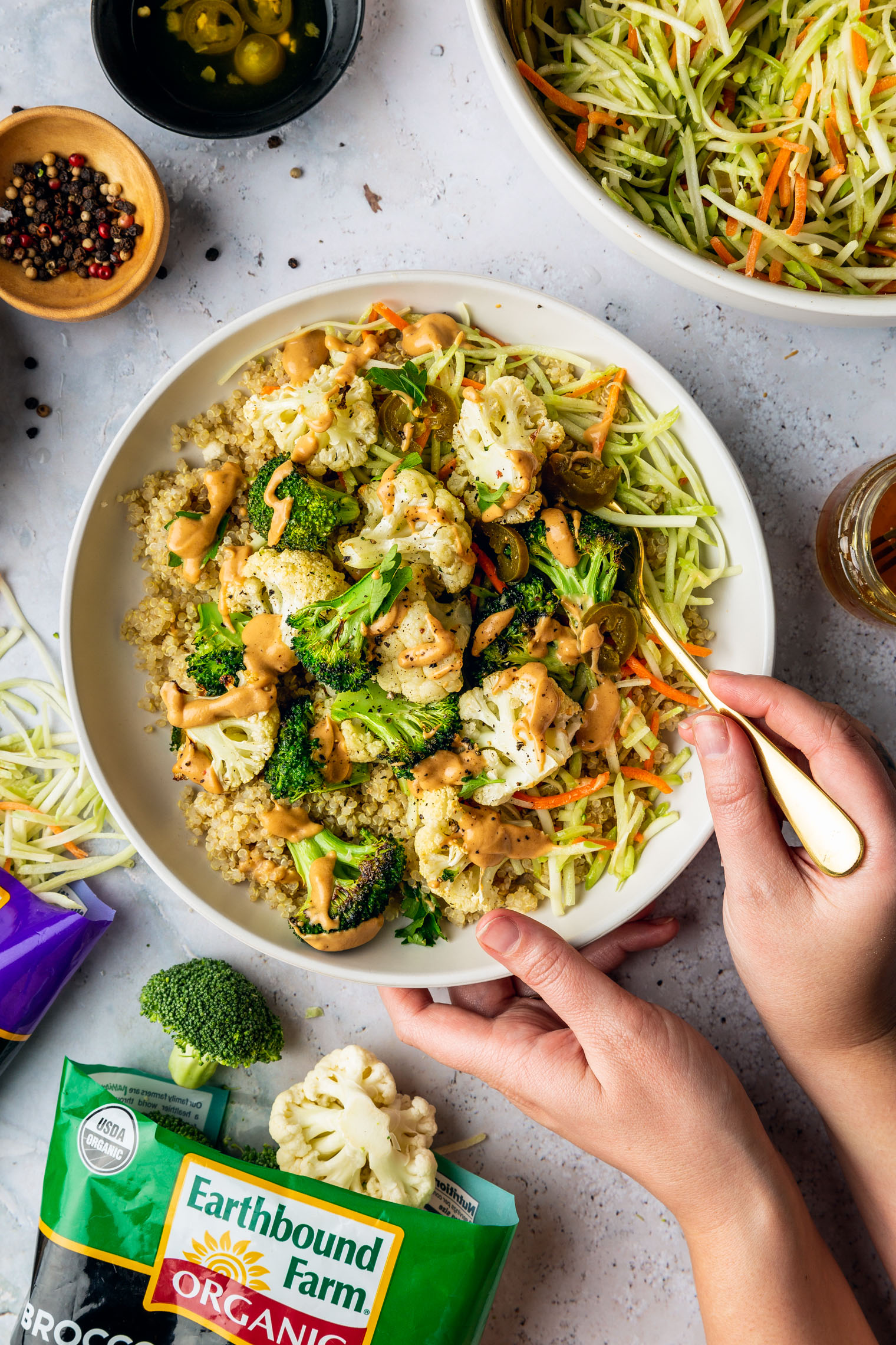 Roasted Broccoli & Cauliflower Bowl with Spicy Peanut Sauce & Tangy Jalapeno Broccoli Slaw