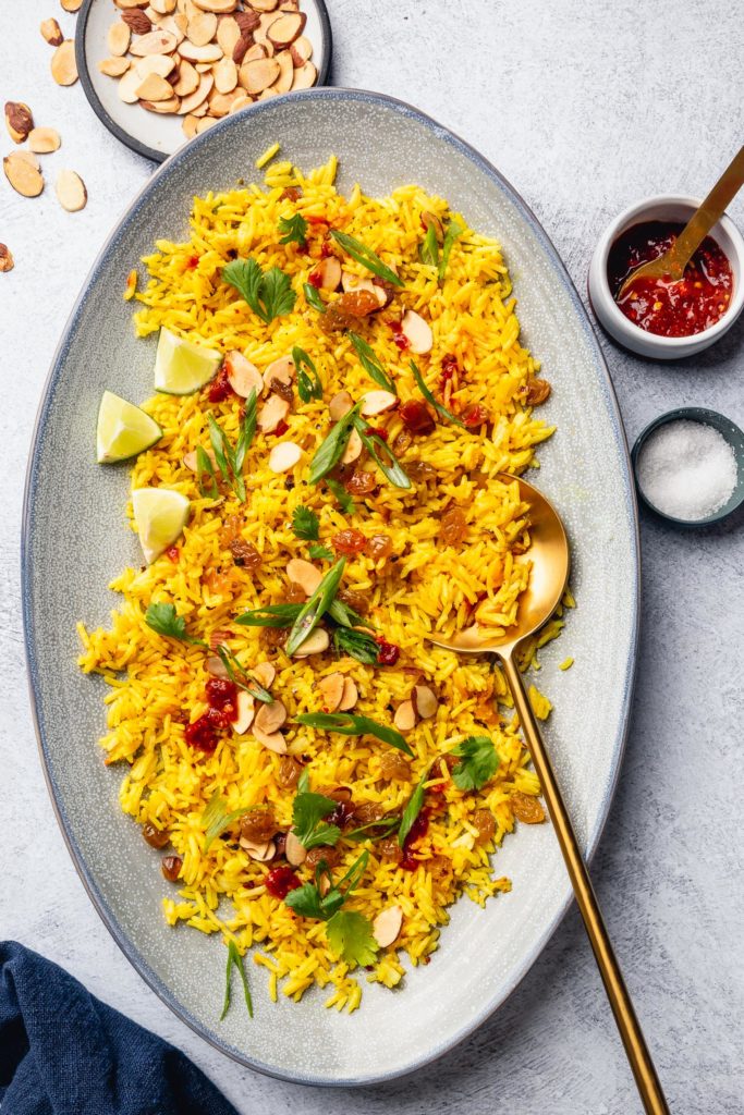 Turmeric Rice with Quick Pickled Golden Raisins & Toasted Almonds