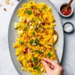 Turmeric Rice with Quick Pickled Golden Raisins & Toasted Almonds