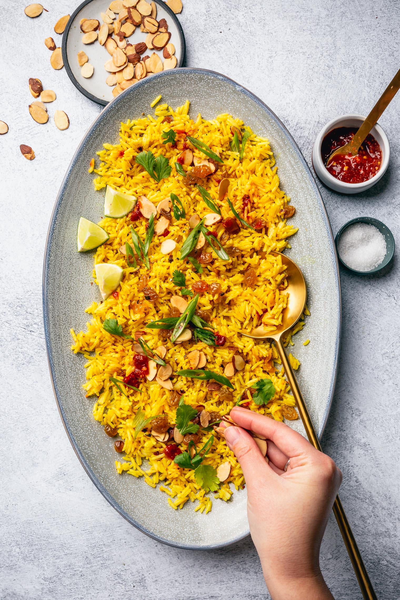 Turmeric Rice with Quick Pickled Golden Raisins & Toasted Almonds