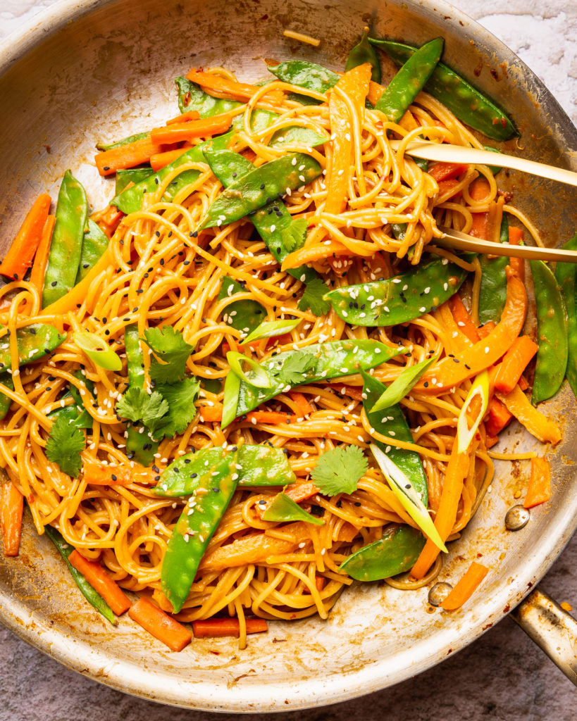 overhead view of Sesame Peanut Noodles in skillet