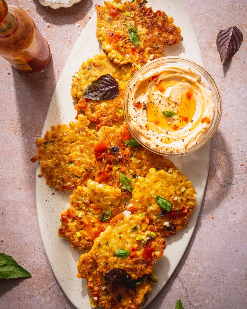 corn fritters on a serving platter ready to eat