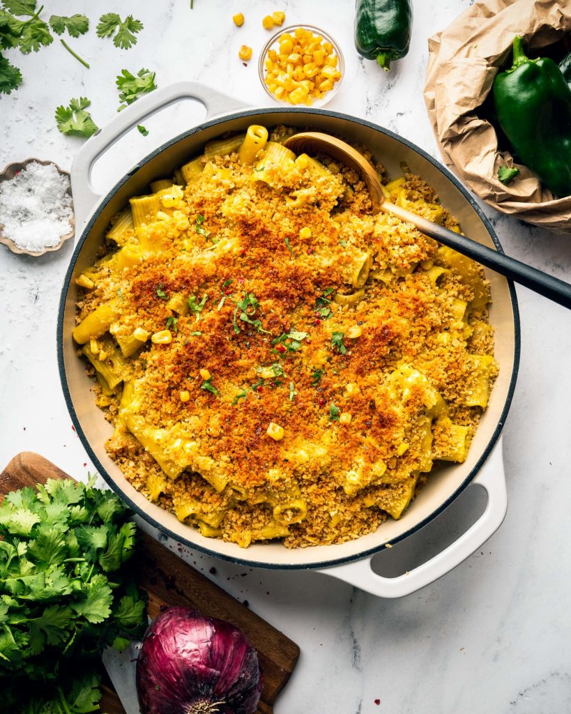 overhead of Cauliflower Mac and Cheese with Poblano and Corn on table