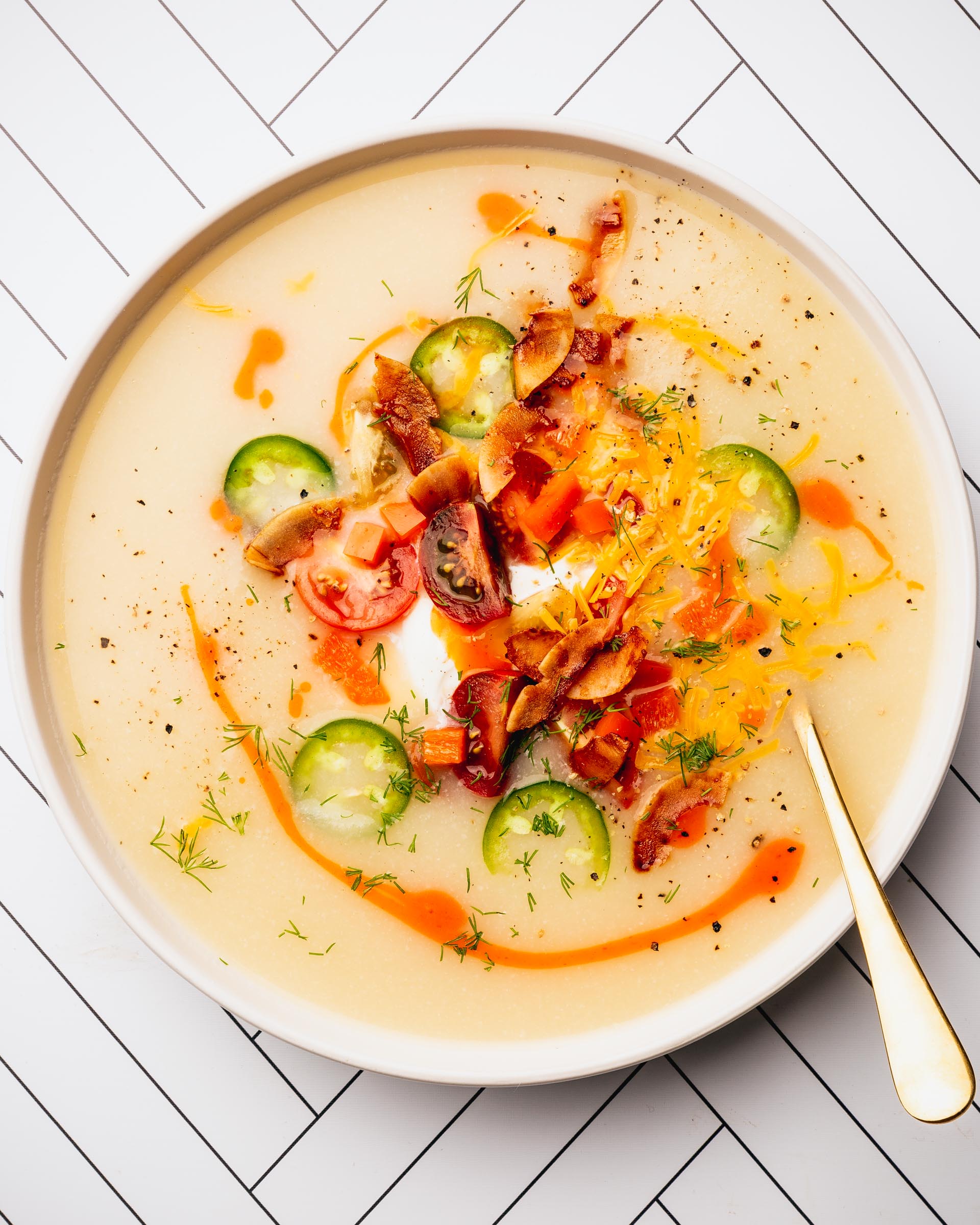 close up of Vegetarian Loaded Baked Potato & Cauliflower Soup 