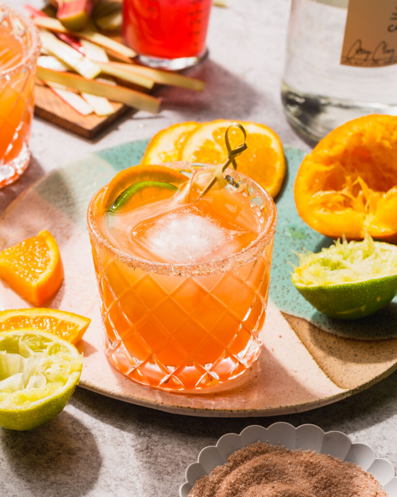 close up of orange rhubarb margaritas