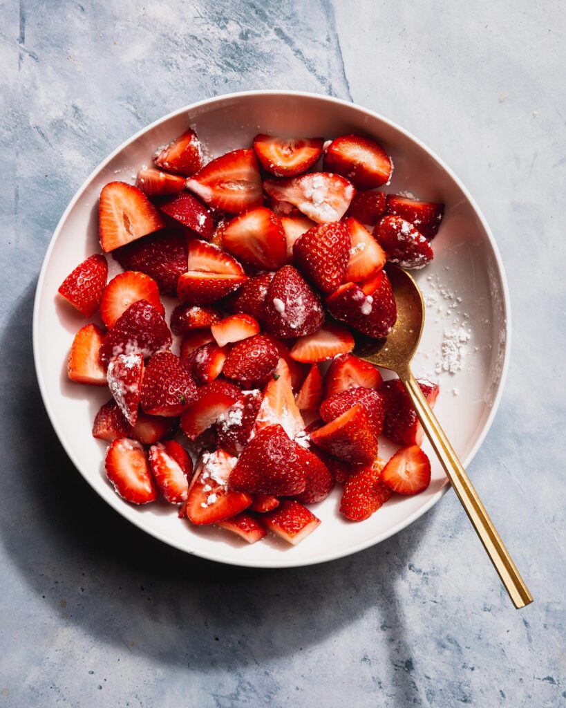 strawberries tossed with powdered sugar